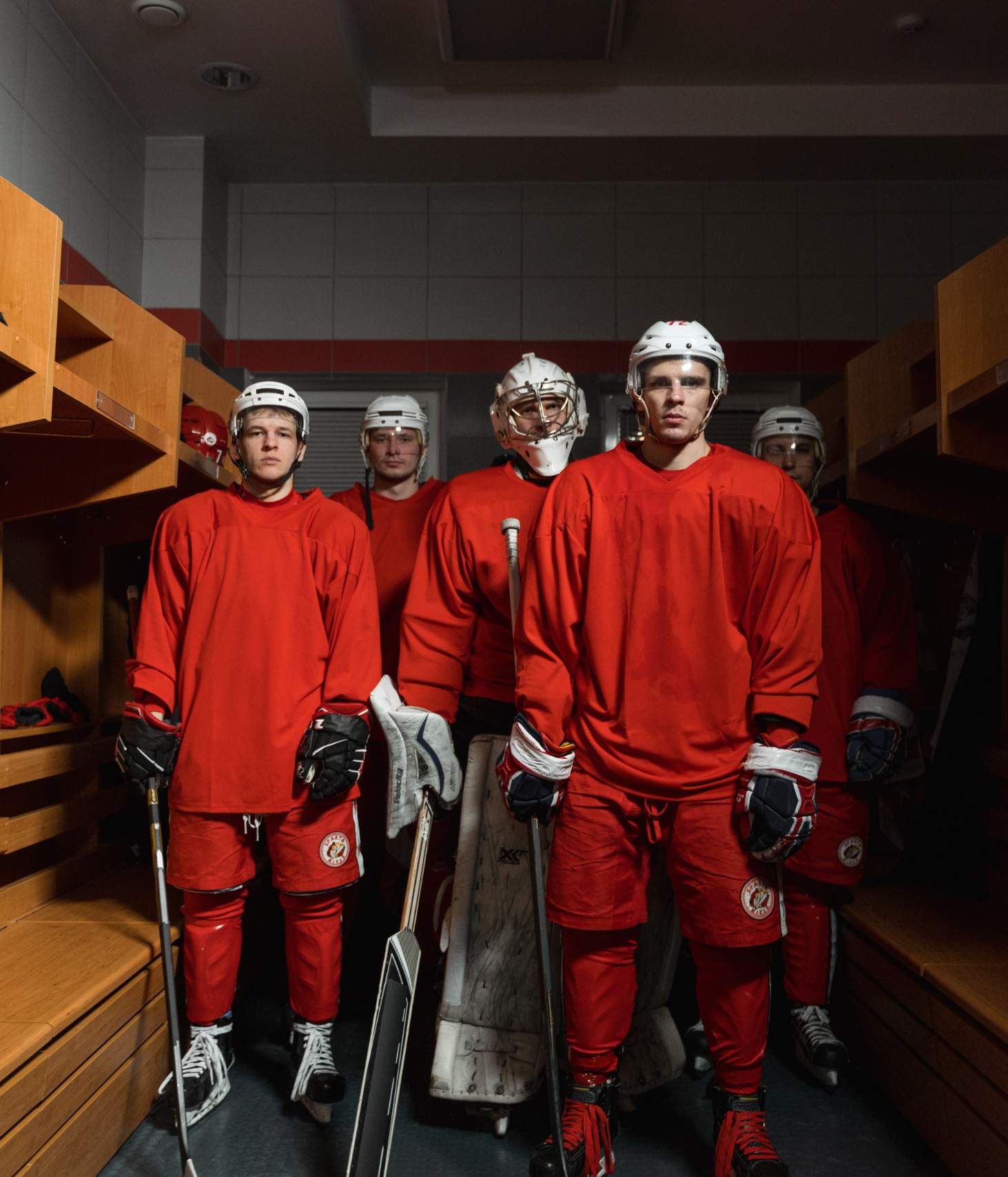 upset hockey players in dressing room